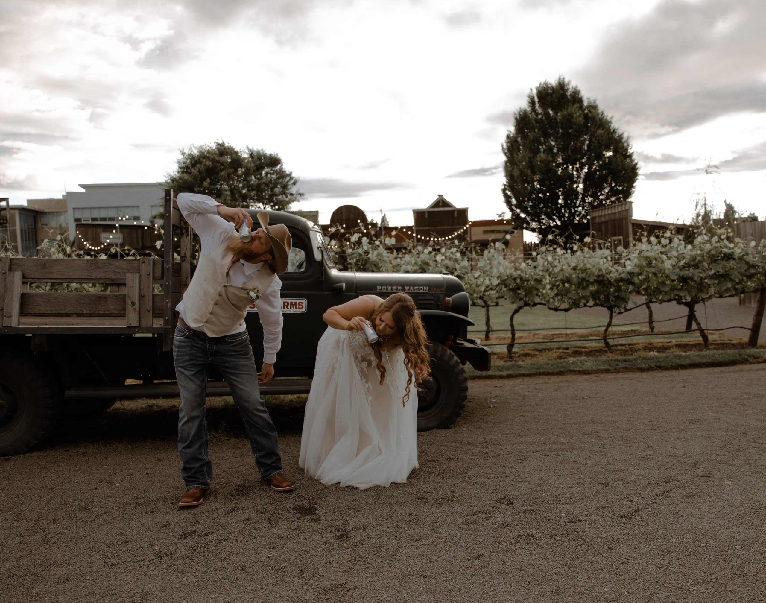 Bride & Groom Shot Gunning a Beer